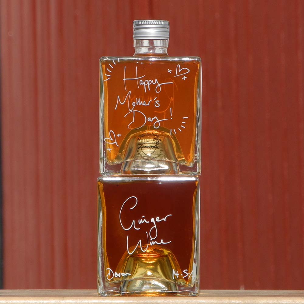 Carrie MaK Cocktail Gift Set with Rhubarb Liqueur and Ginger Wine in cube stacking bottles with a personal Mothers Day hand written message on the bottle